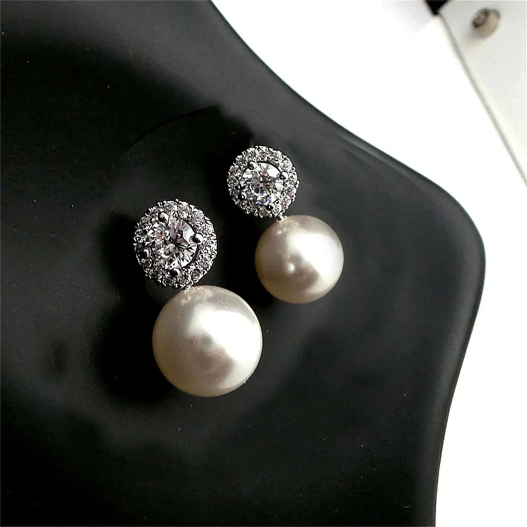 A pair of 925 silver pearl-inlaid earrings for ladies