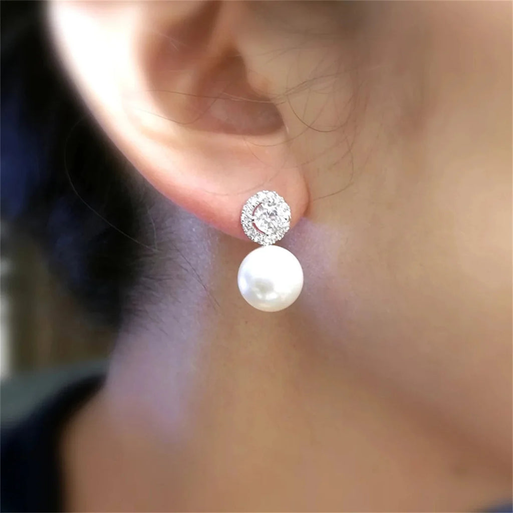 A pair of 925 silver pearl-inlaid earrings for ladies