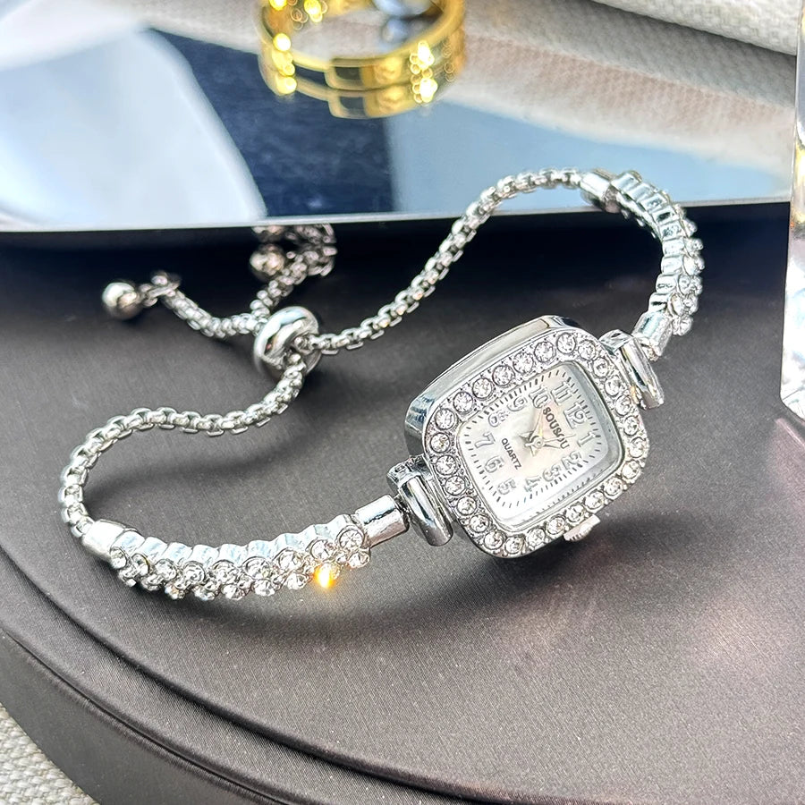 ladies' small square watch features a double-row diamond bracelet