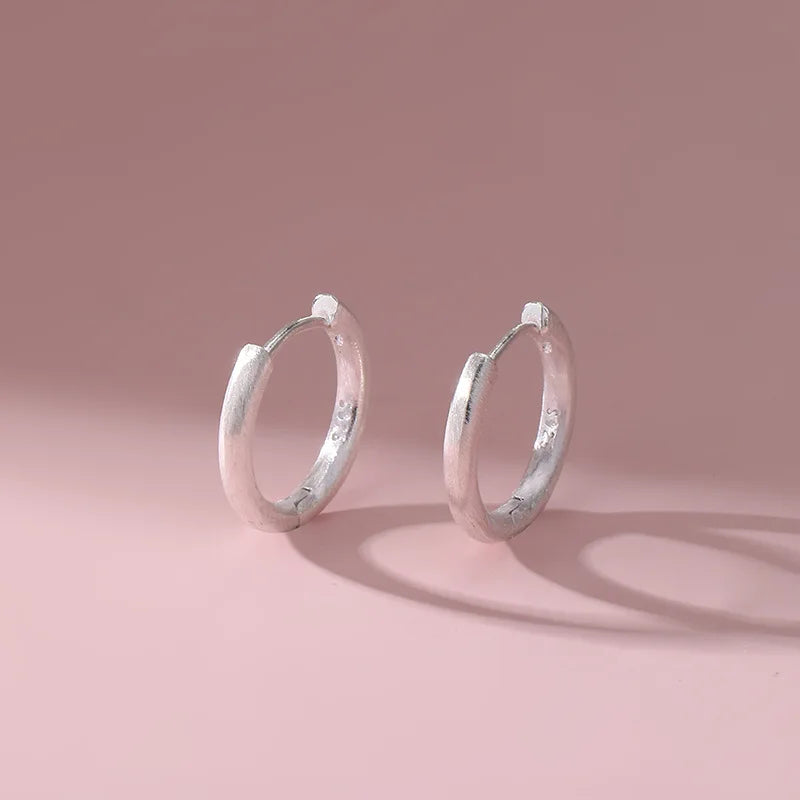 Silver Round Geometric Brushed Earrings