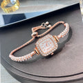 ladies' small square watch features a double-row diamond bracelet
