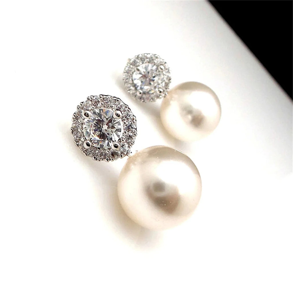 A pair of 925 silver pearl-inlaid earrings for ladies