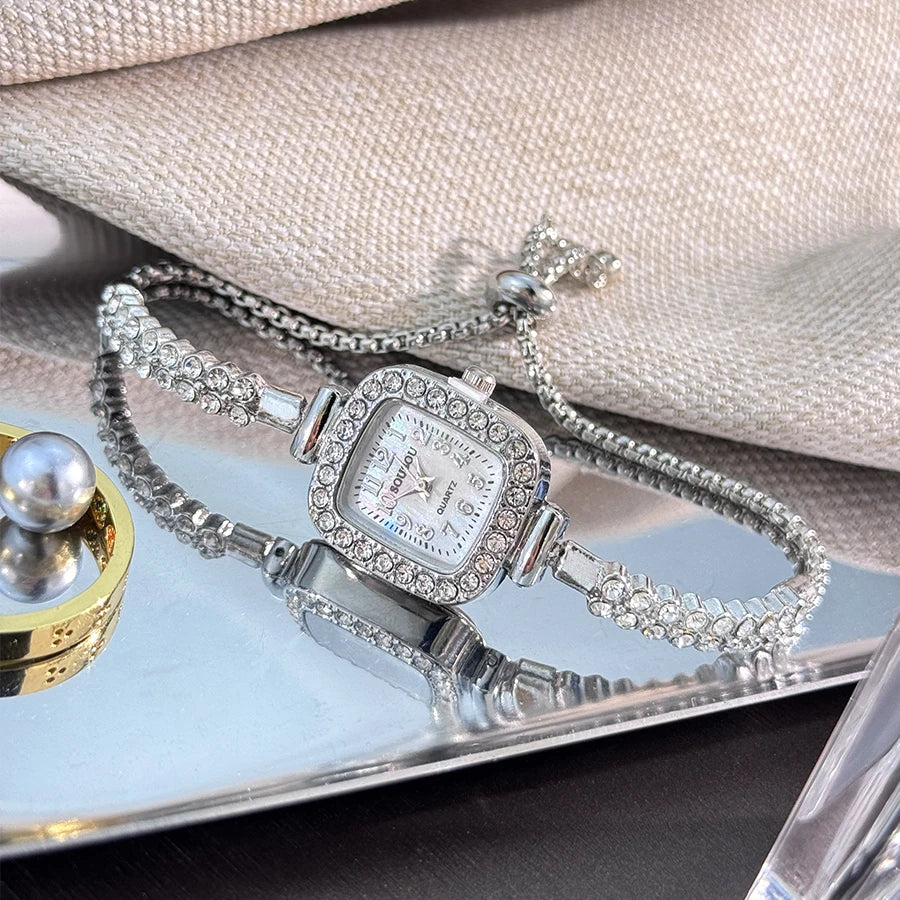 ladies' small square watch features a double-row diamond bracelet