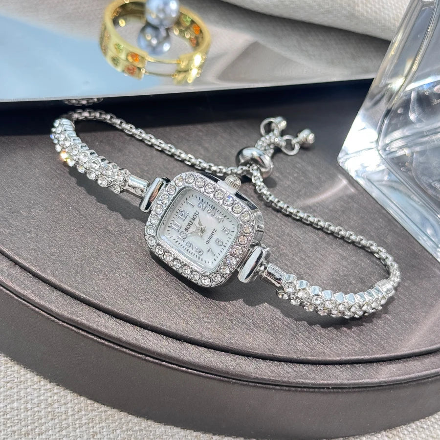 ladies' small square watch features a double-row diamond bracelet