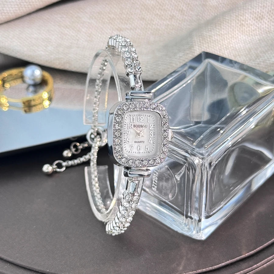 ladies' small square watch features a double-row diamond bracelet